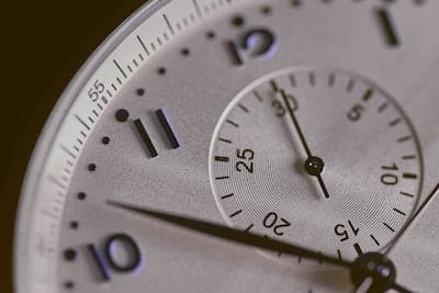Close-up of a clock face symbolizing time efficiency with SpineLegal Software's legal management solutions.
