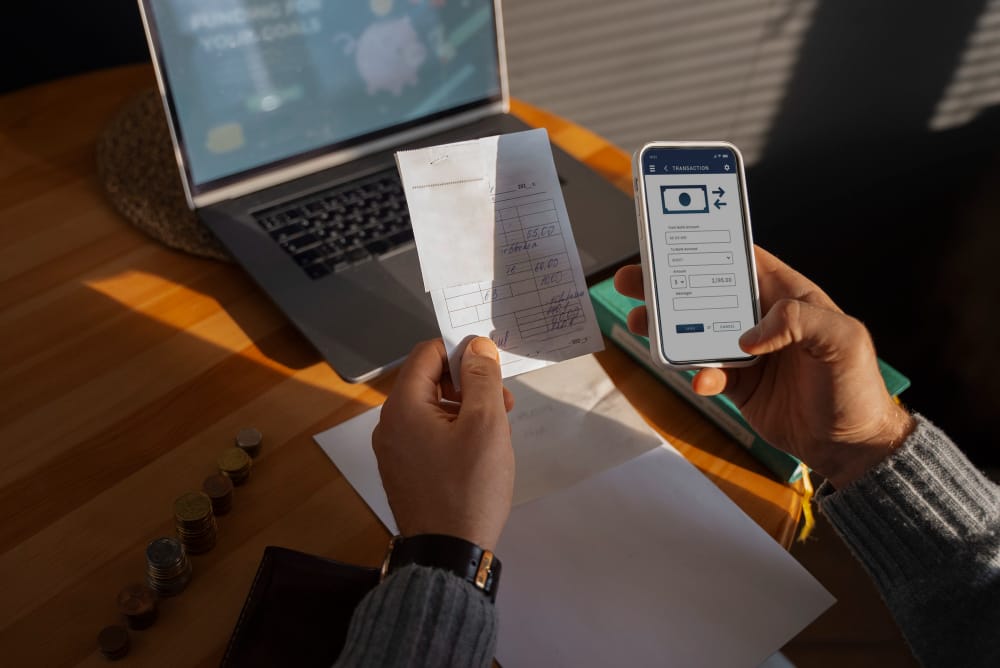 Person using SpineLegal Software for managing finances using e-chit management.