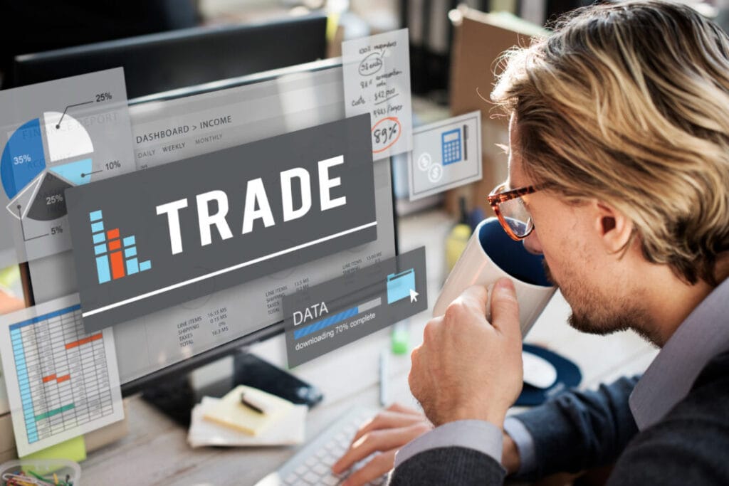 Man analyzing trademark data on computer screen, using SpineLegal Software for legal analytics and productivity.